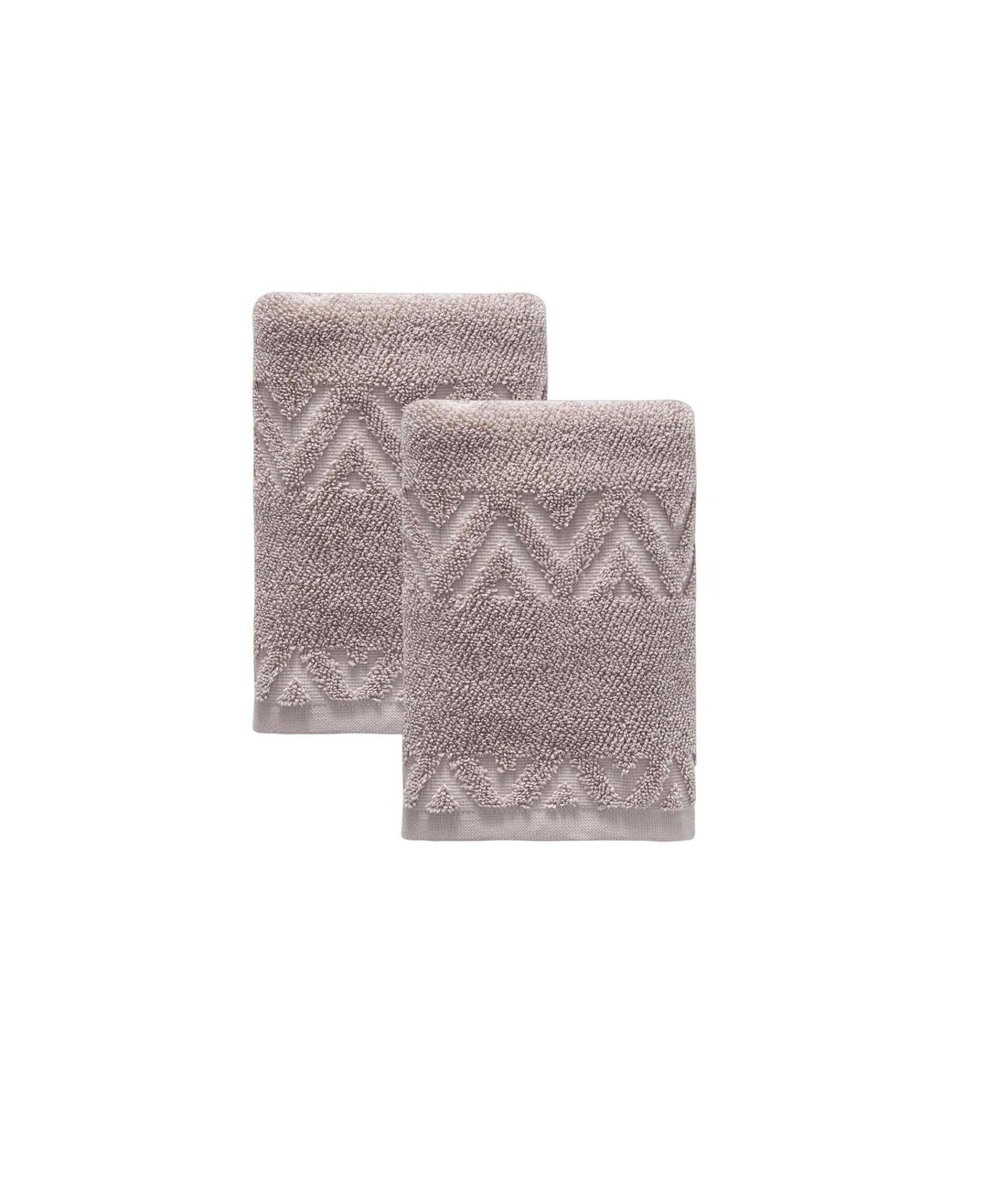 Set of two Turkish cotton hand towels, taupe, one folded back, zigzag geometric pattern