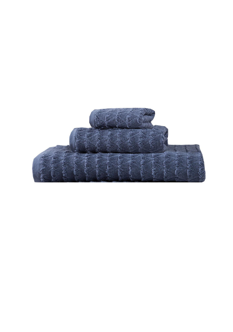 Navy geometric Turkish cotton towels, neatly folded trio stack