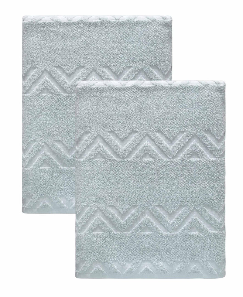 Set of two aqua bath sheets, folded, with embossed chevron geometric pattern