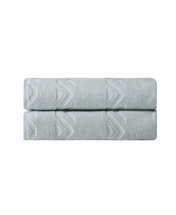 Set of two aqua Turkish cotton bath towels with white zigzag geometric pattern, folded