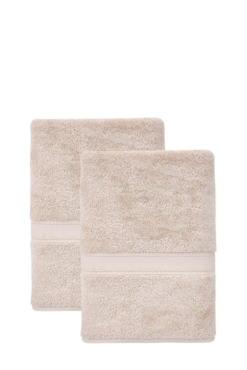 Set of two bath towels, light tan terry loops with stitched striped bands, folded pair.