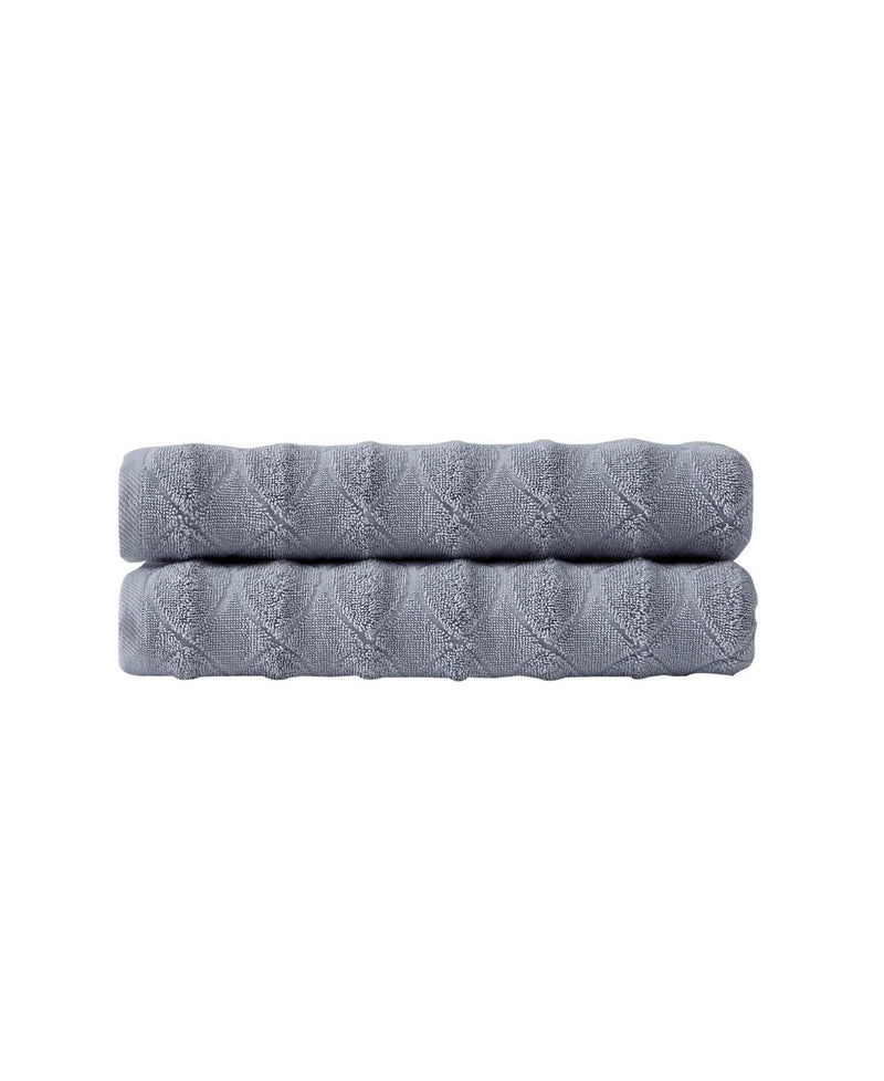 Light gray bath towel set of two, folded stack, diamond geometric pattern