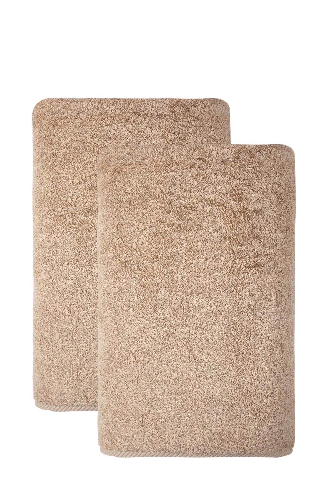 Beige Turkish cotton bath towels, set of two, folded and overlapping, 40 x 70 in