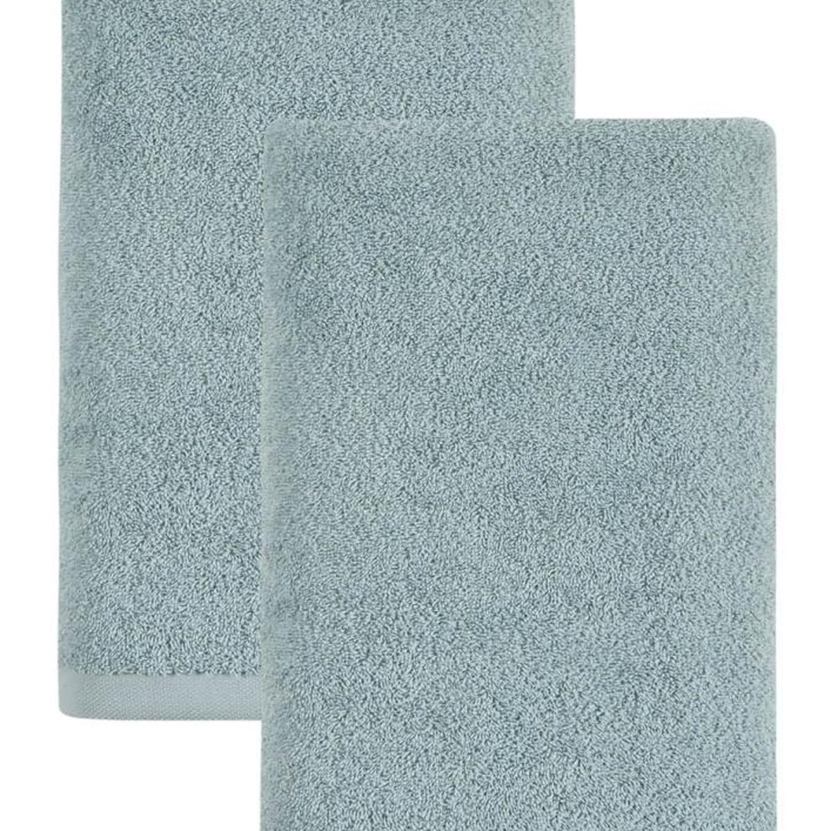 Set of two teal bath towels, folded and stacked