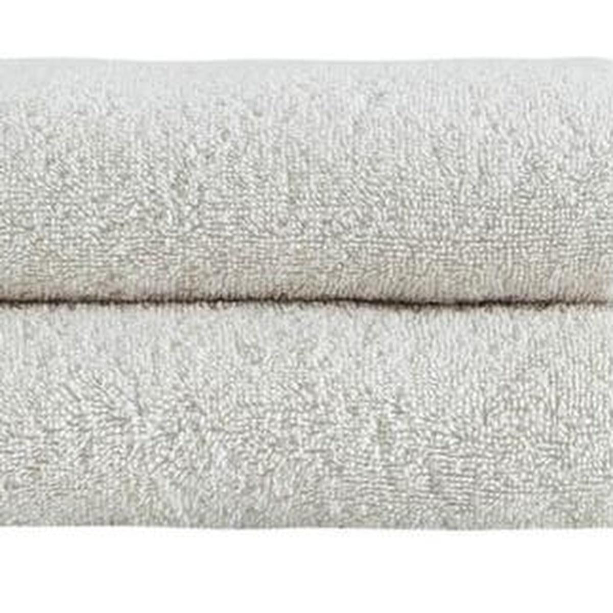 Beige Turkish cotton hand towel with textured woven surface and folded edge