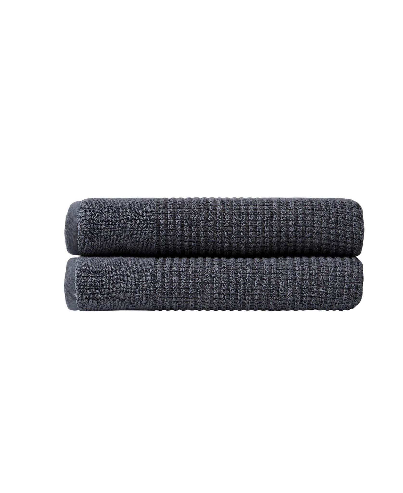 Set of two dark gray bath towels with textured waffle weave, stacked.