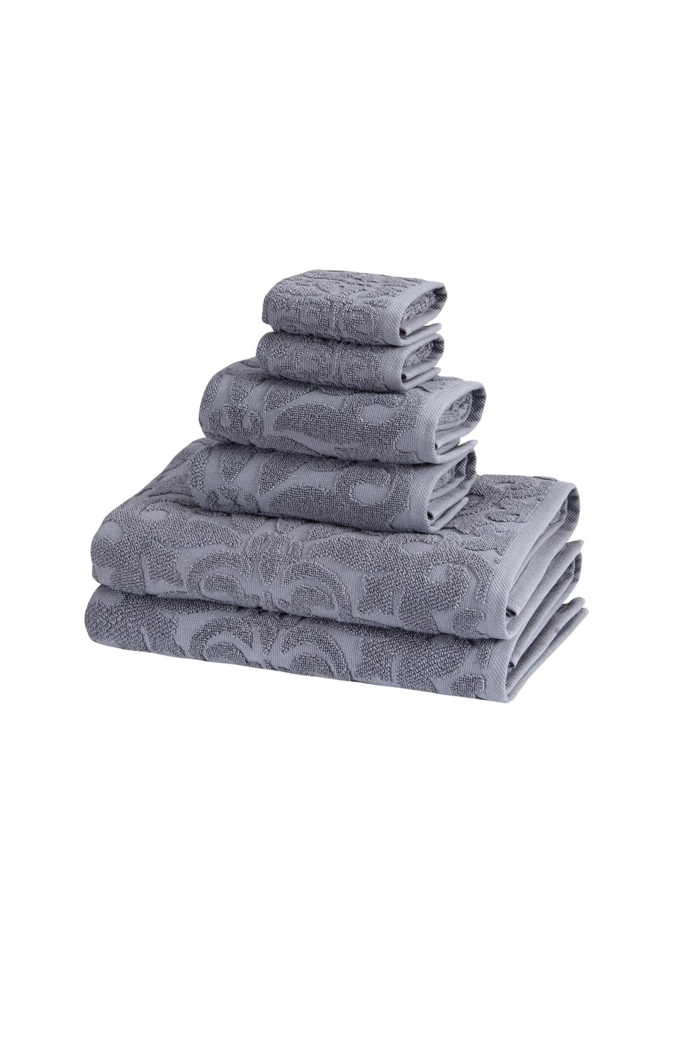 Light gray towel set, small folded stack with floral jacquard pattern