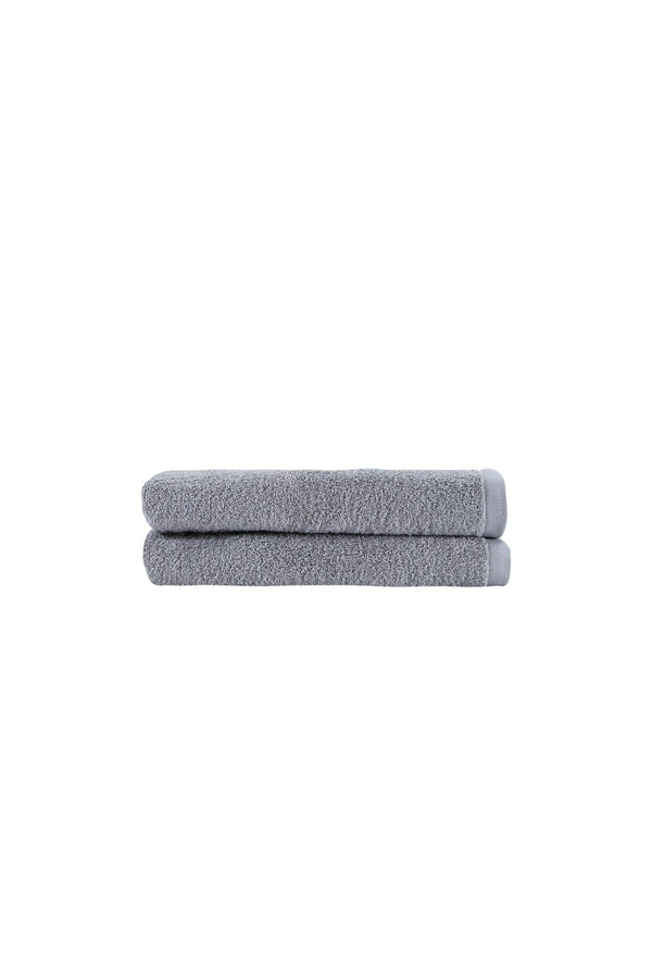 Set of two light gray Turkish cotton bath towels, folded, looped texture