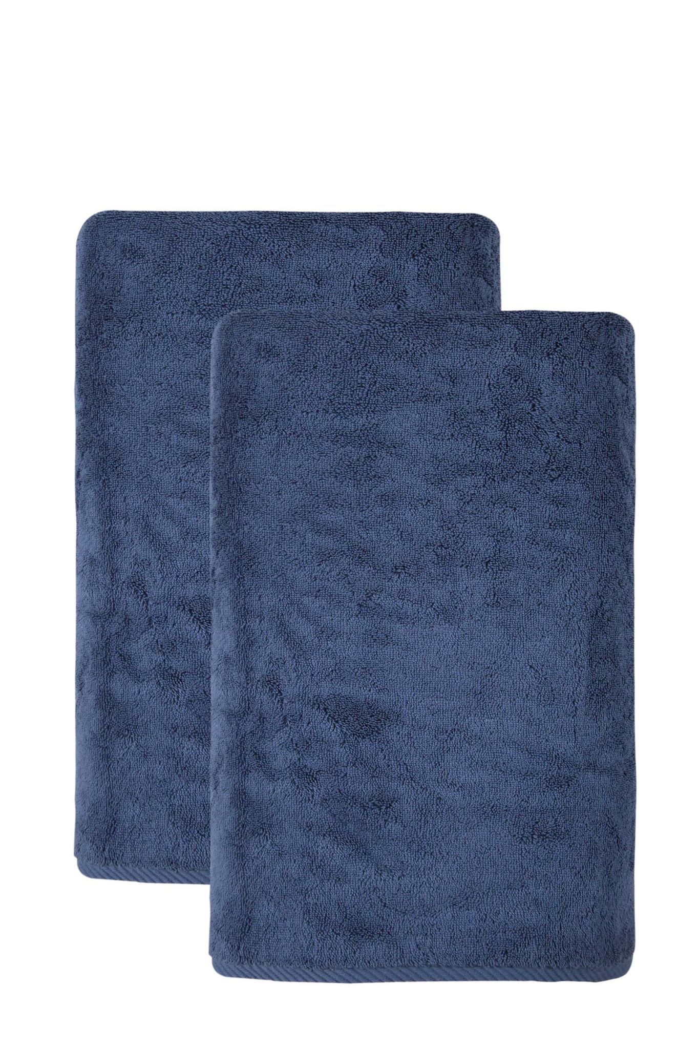 Set of two navy Turkish cotton bath towels, 27x54 in, folded and stacked.