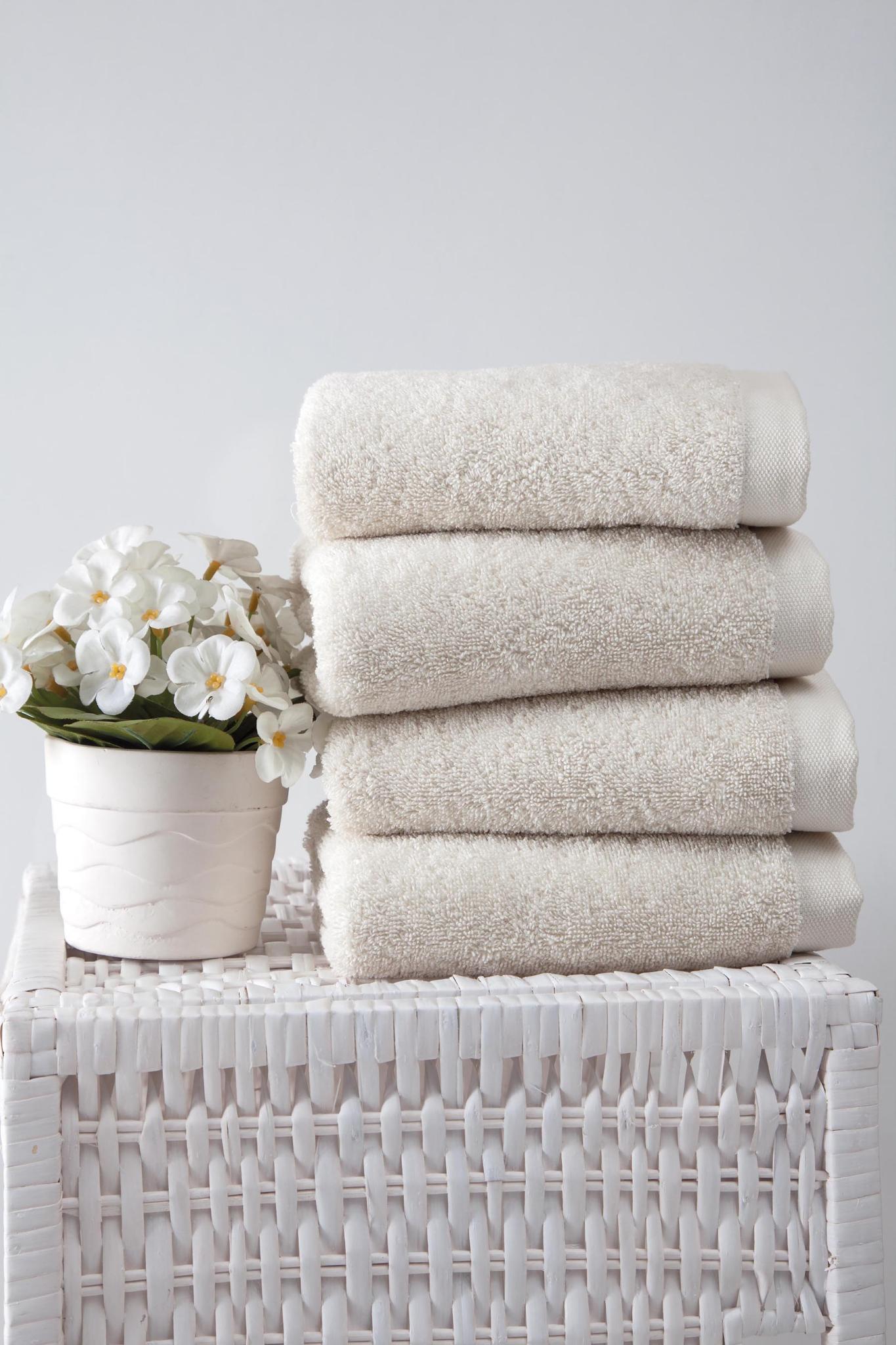 Beige Turkish cotton hand towels, stacked