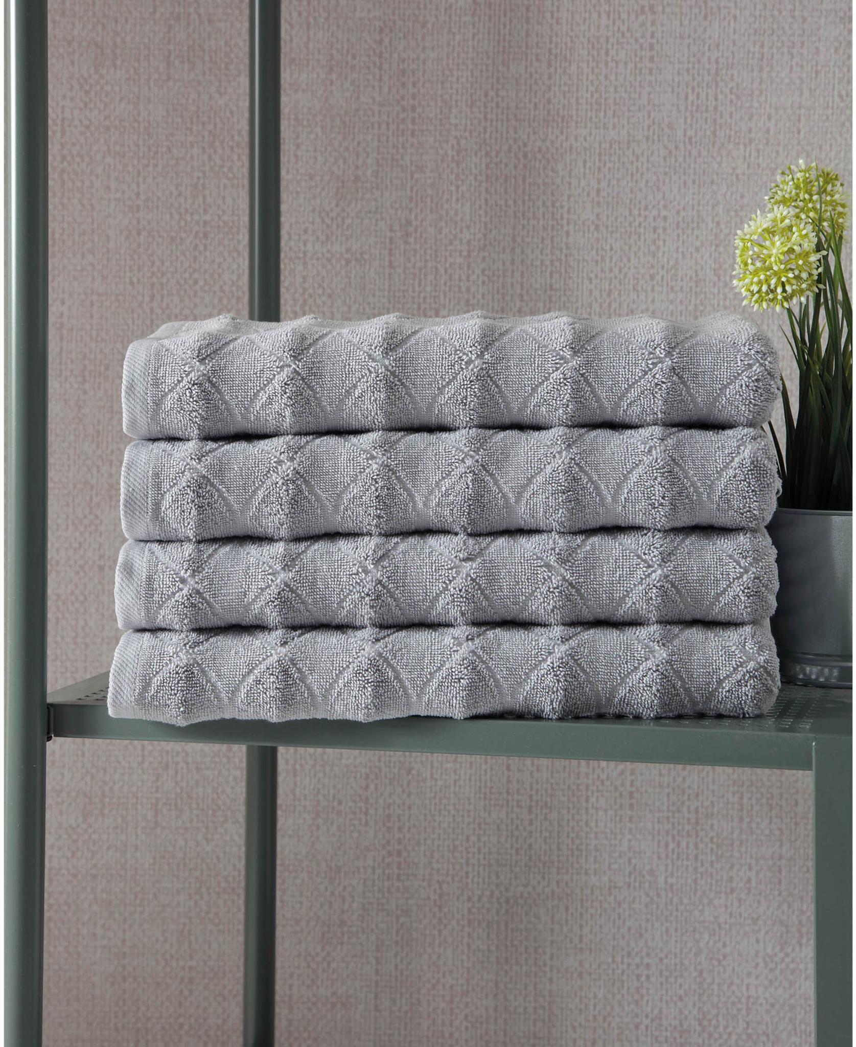 Gray Turkish cotton bath towels set, folded with geometric pattern, 27 x 54 in