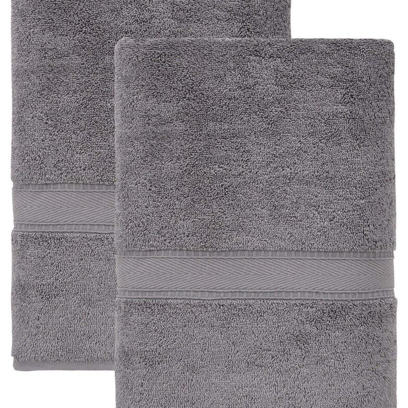 Set of two dark gray bath towels stacked, textured Turkish cotton with border stripe