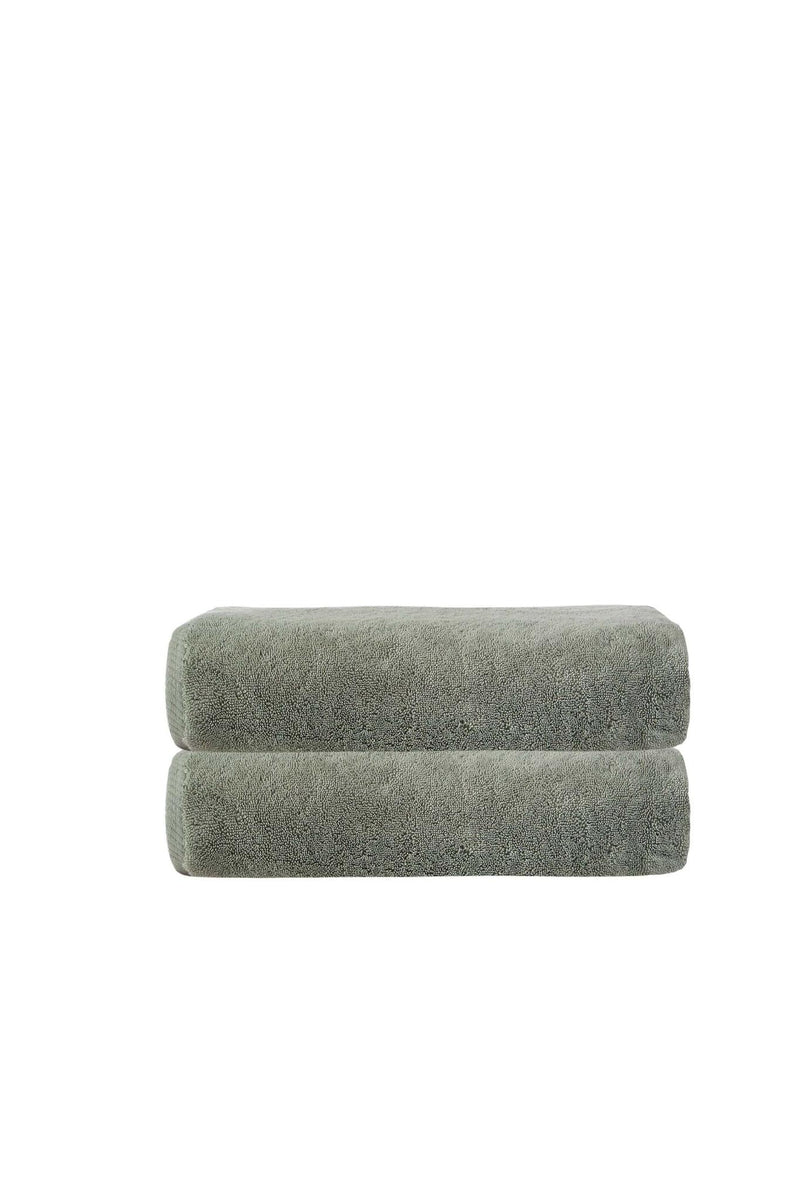 Set of two green Turkish cotton bath towels, two towels folded together
