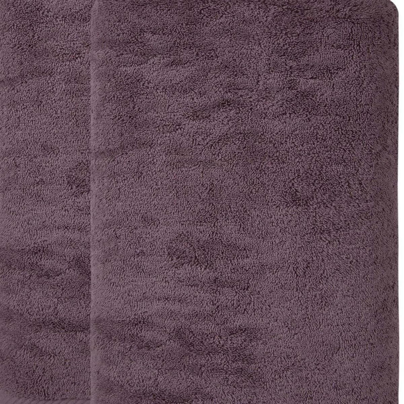Purple Turkish cotton towel fabric close-up, plush looped texture