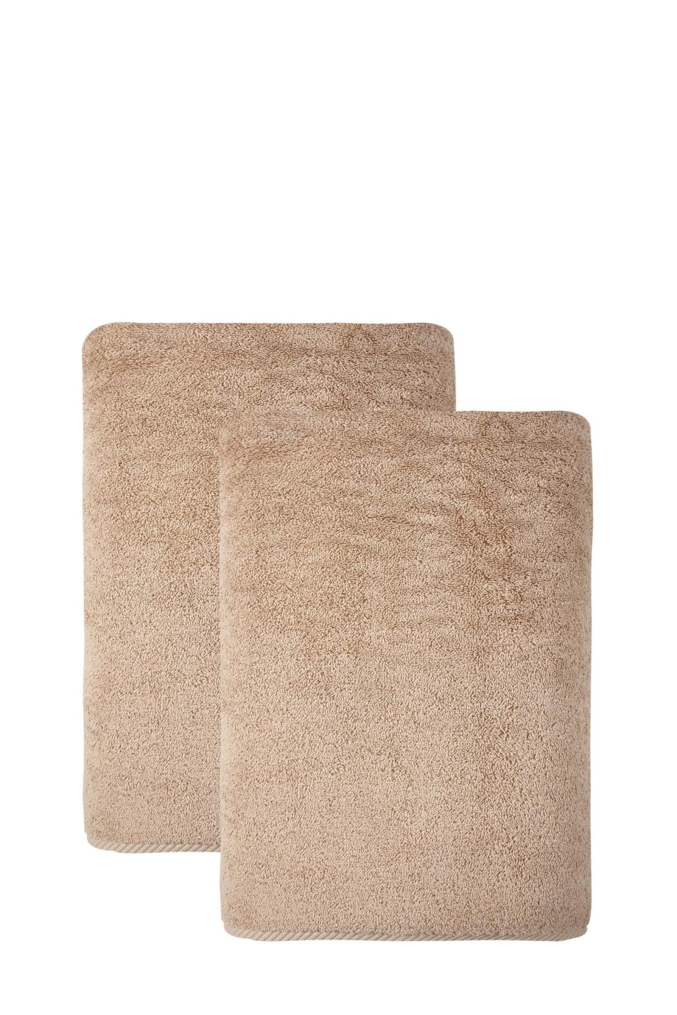 Set of two beige Turkish cotton bath towels, textured loop pile, folded