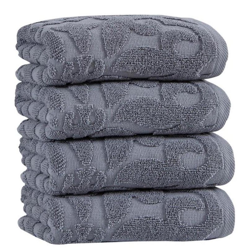 Gray floral Turkish cotton hand towels, neatly folded stack with pattern
