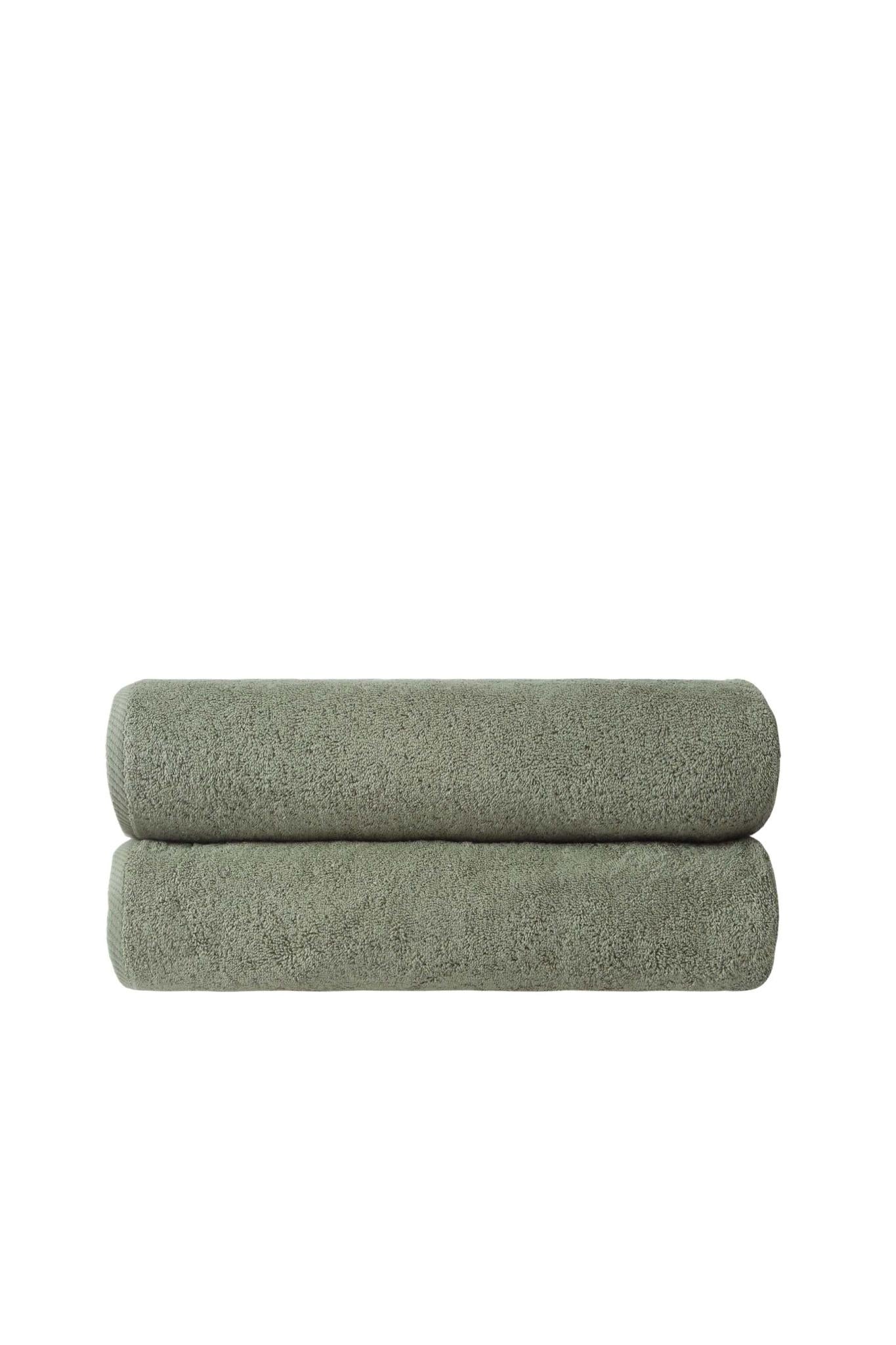 Set of two green Turkish cotton bath sheets, folded and stacked, 40 x 70 in