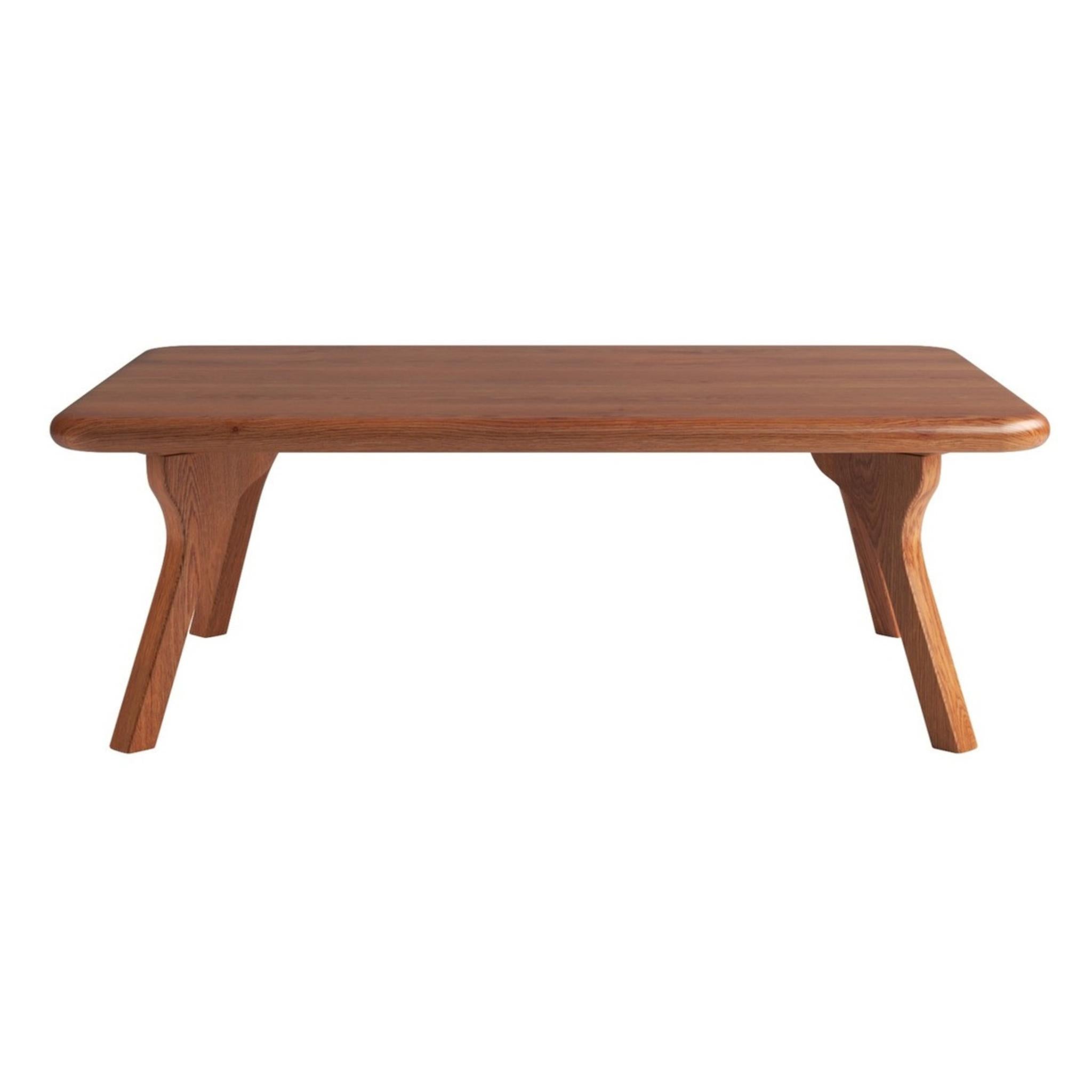 Walnut solid wood coffee table with rounded rectangular tabletop and tapered end legs