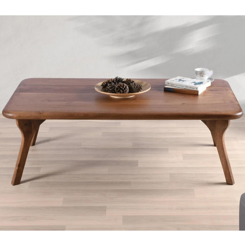 Walnut solid wood coffee table with smooth rounded edges and four angled legs