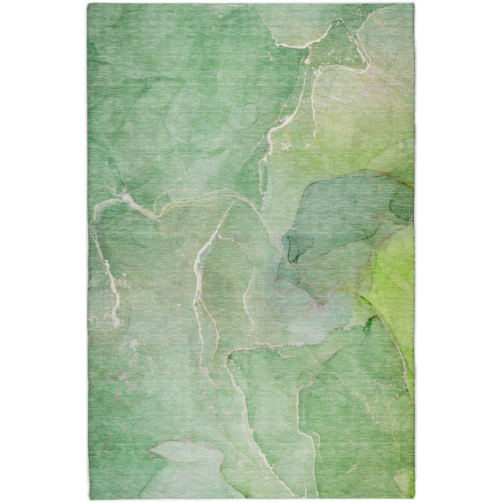 Green and teal abstract area rug with off-white line accents and rectangular shape.