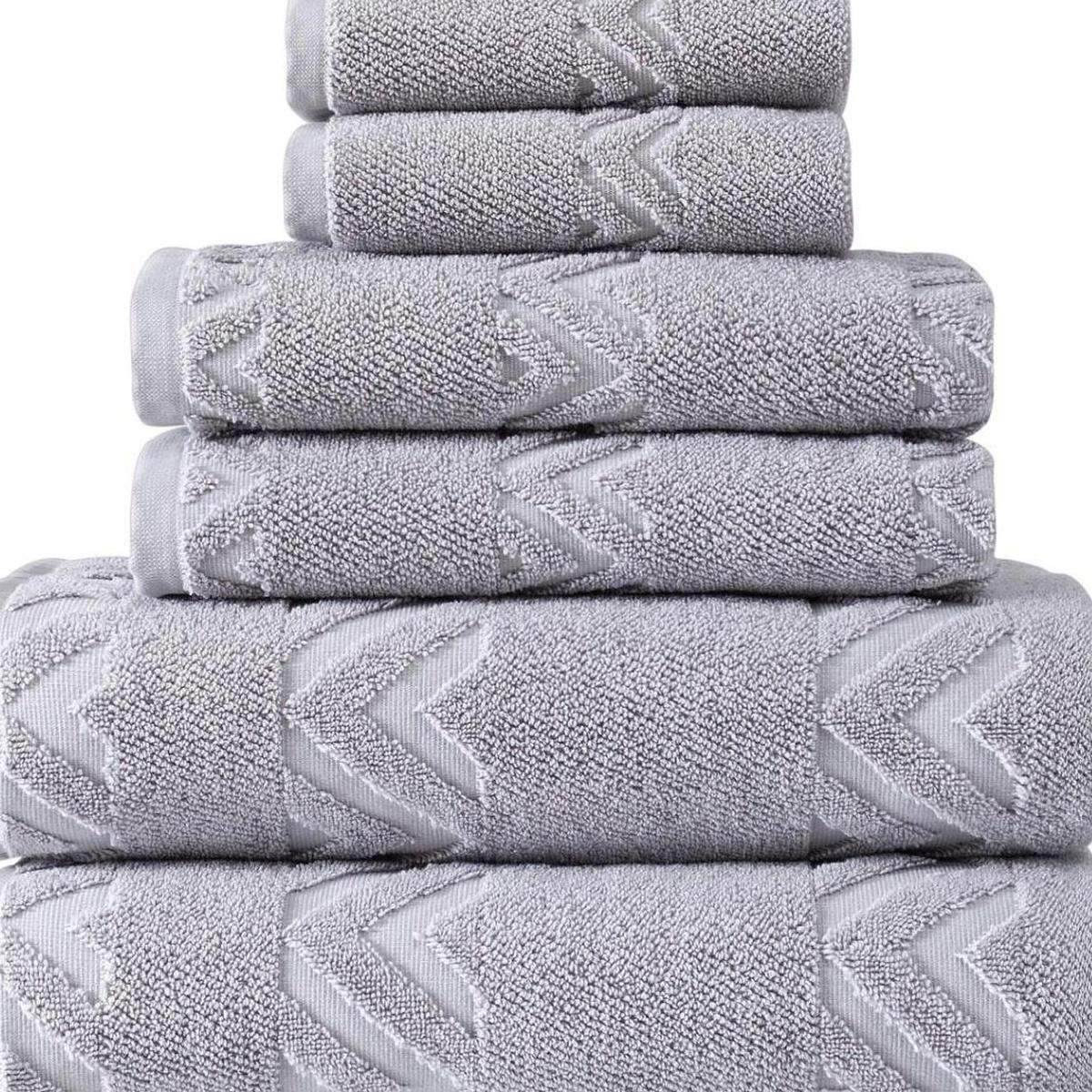 Light gray chevron-pattern Turkish cotton towels, stacked