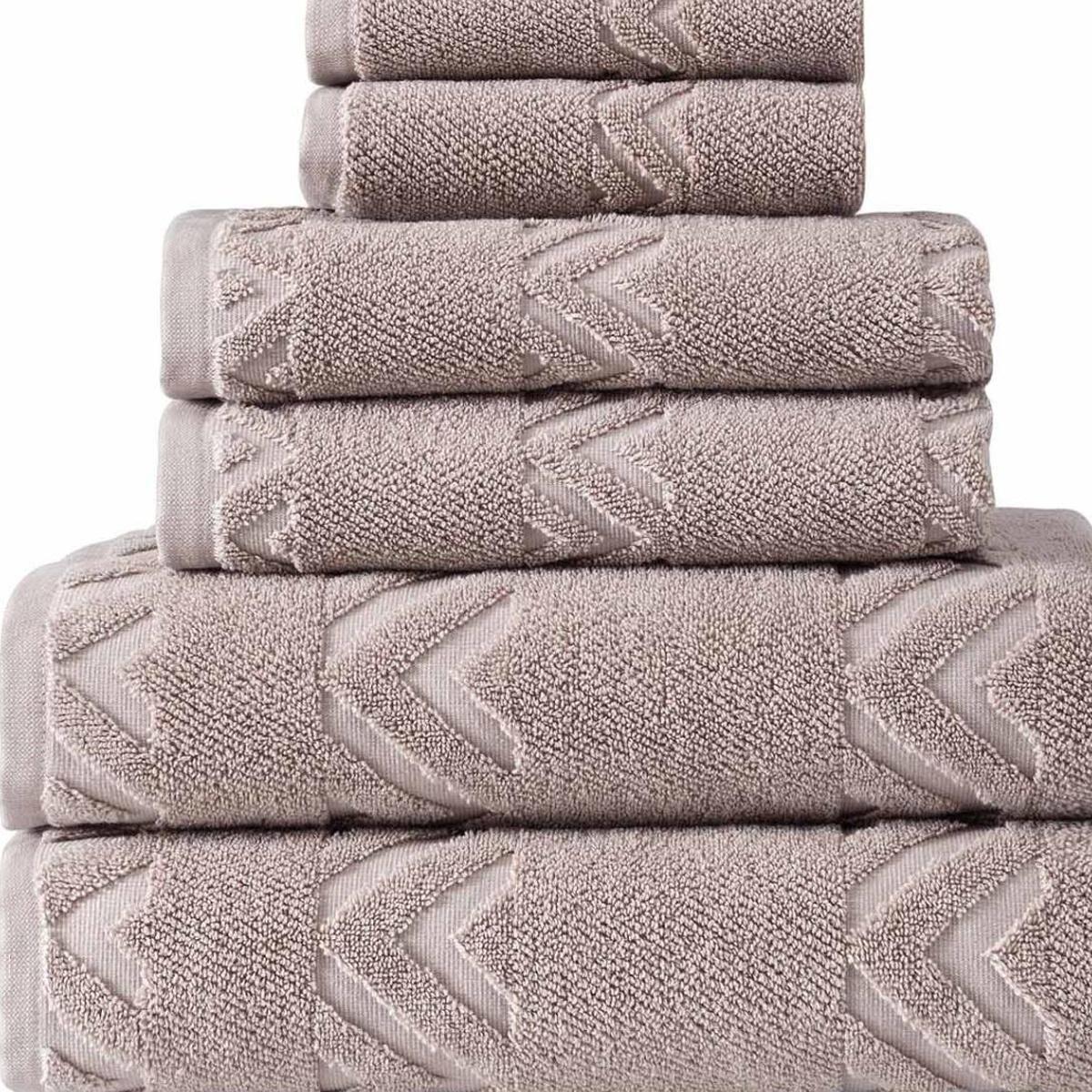 Stacked Turkish cotton towels, taupe with chevron geometric embroidery detail