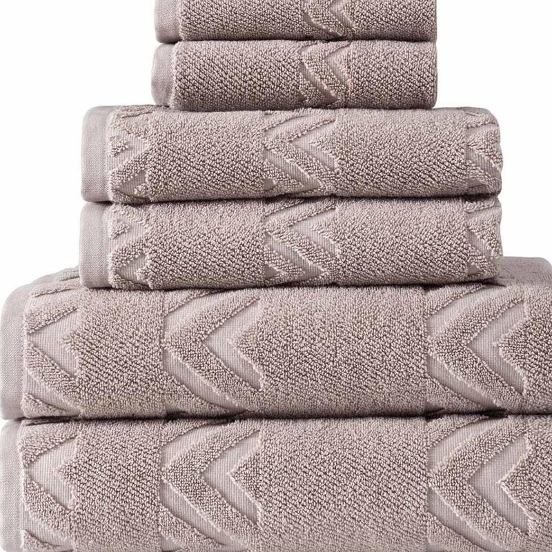 Stacked Turkish cotton towels, taupe with chevron geometric embroidery detail