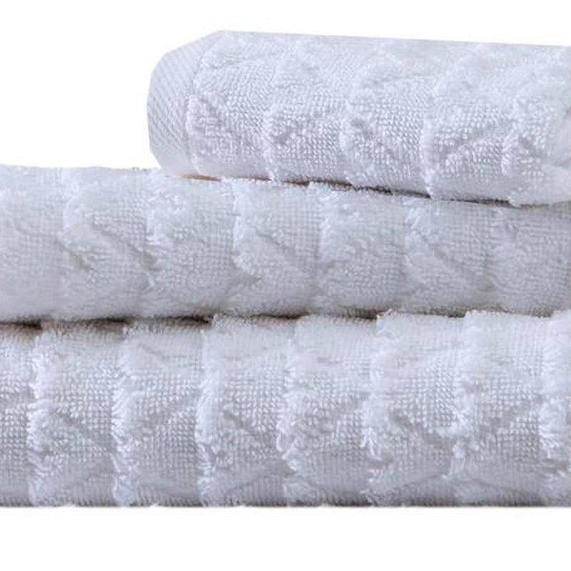 White Turkish cotton towels featuring subtle geometric pattern, textured jacquard