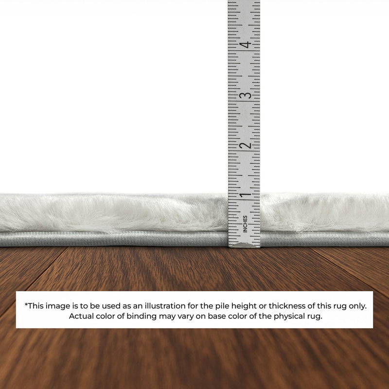 Shag area rug pile height measurement with ruler along the gray bound edge