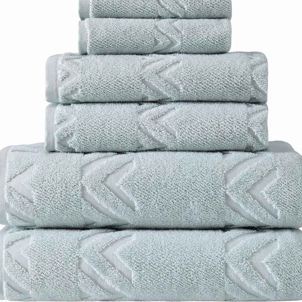 Aqua geometric Turkish cotton towel set, folded stack with chevron pattern