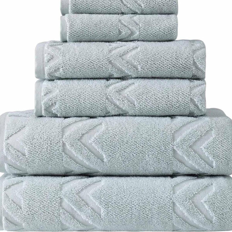 Aqua geometric Turkish cotton towel set, folded stack with chevron pattern
