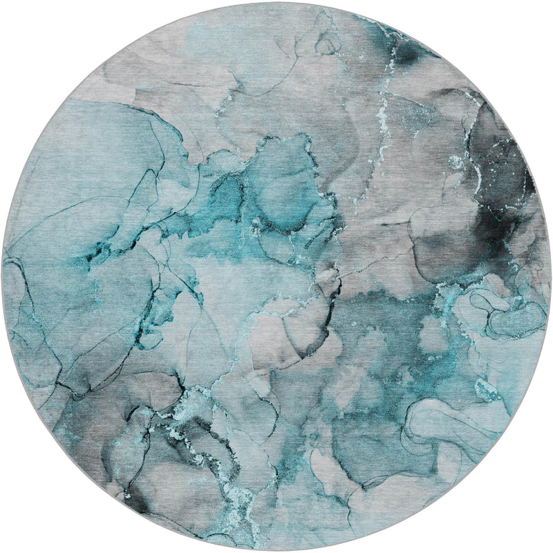 Round abstract teal and gray shag rug, top view