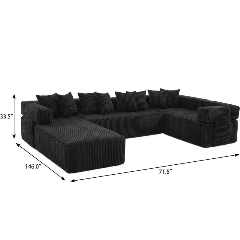 Dark corduroy sectional sofa with U-shaped layout, corner blocks, and throw pillows