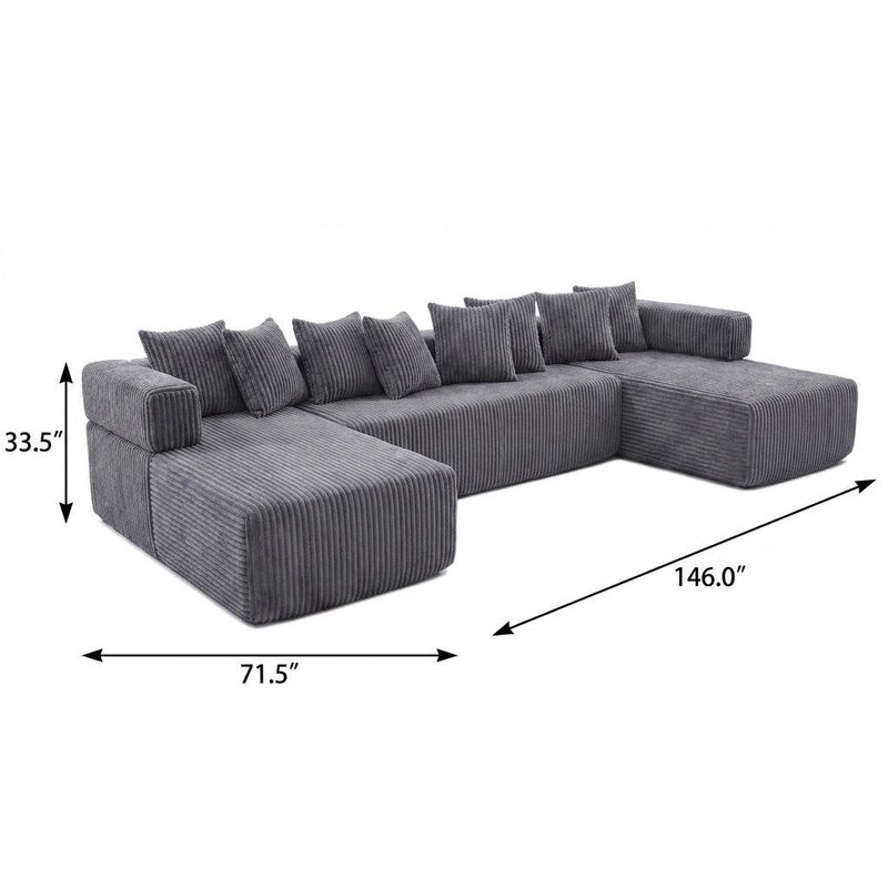 Dark gray corduroy U-shaped sectional sofa with multiple back cushions and chaise