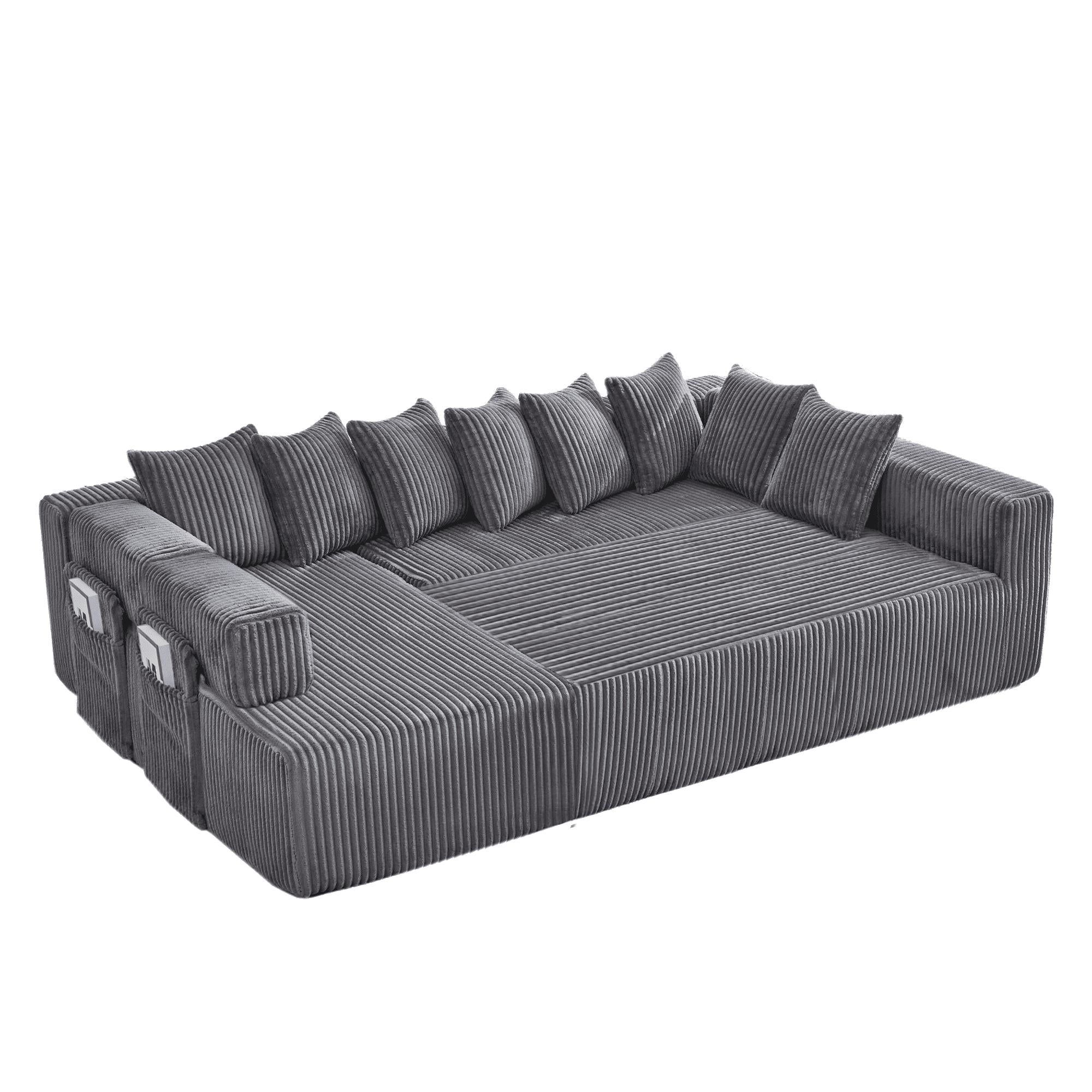 Dark gray corduroy sectional sofa with tufted seat, deep chaise, and back cushions