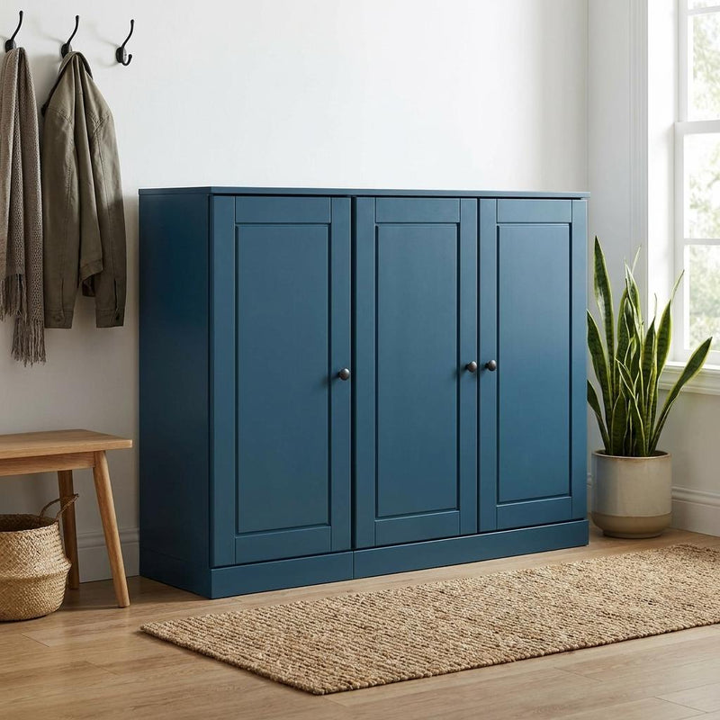 Teal blue shoe storage cabinet with four front doors and round knobs