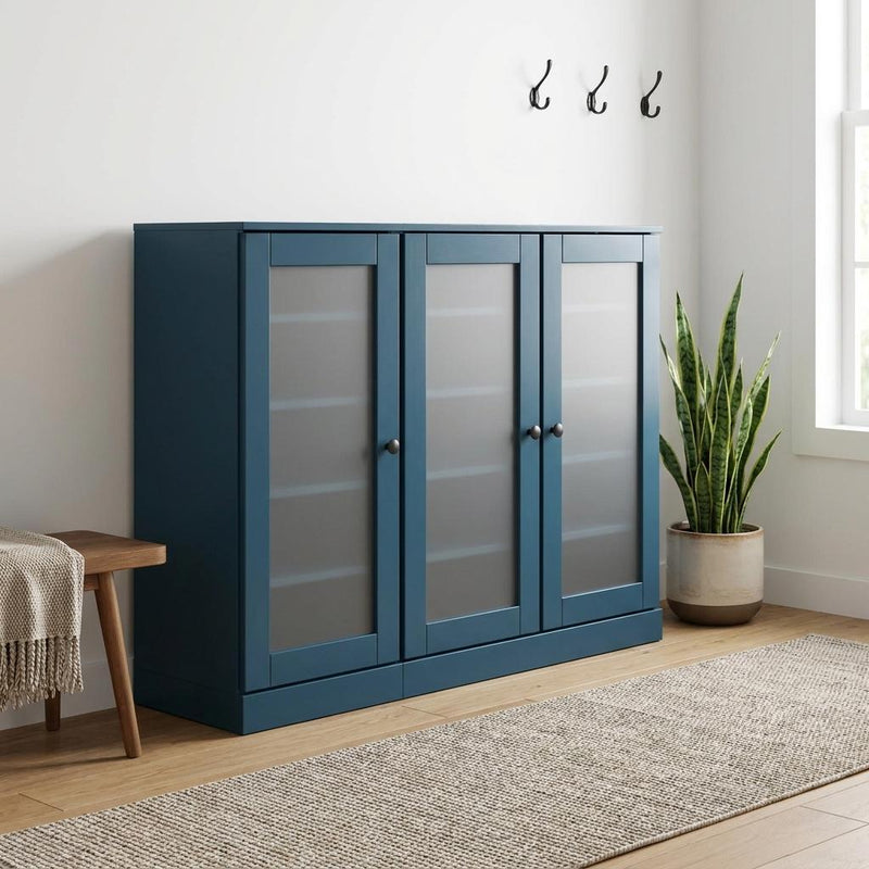 Teal blue wood shoe storage cabinet with three glass-panel doors and shelves