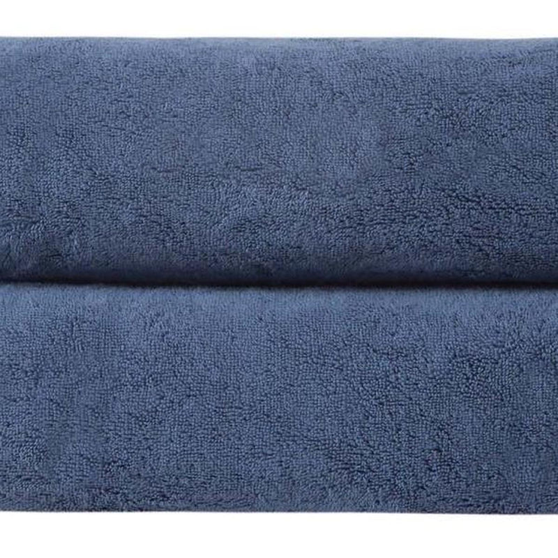 Navy Turkish cotton bath towel texture, 27x54 in, close-up.