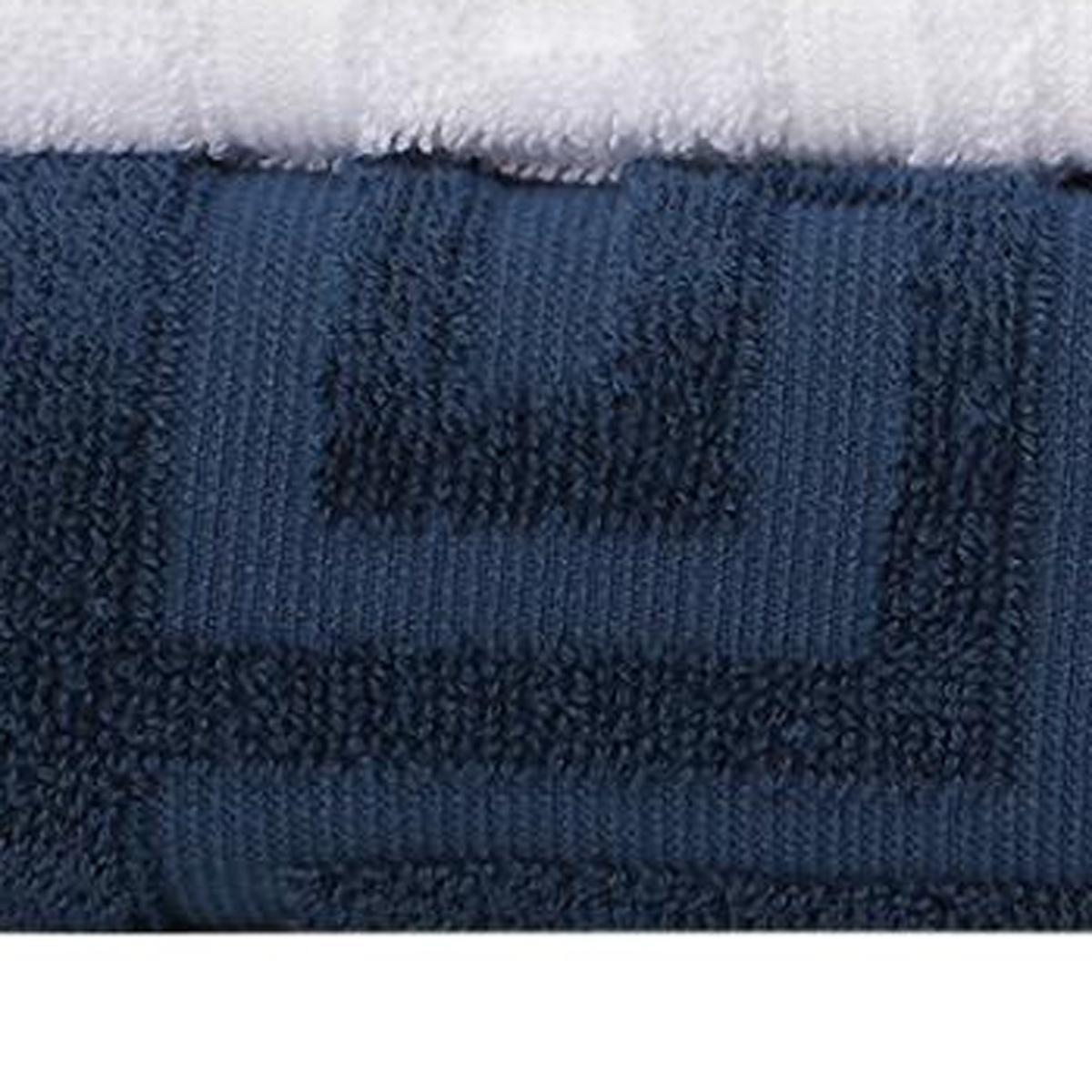 Navy Turkish cotton towel with textured weave and stitched Greek key stripe