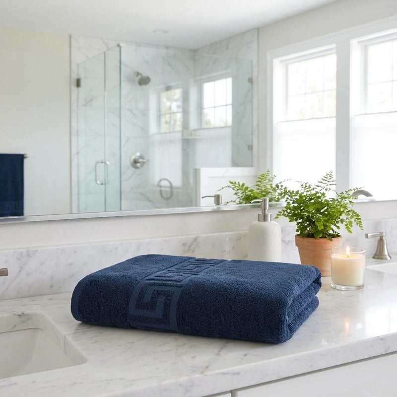 Navy Turkish cotton towel folded with Greek key border