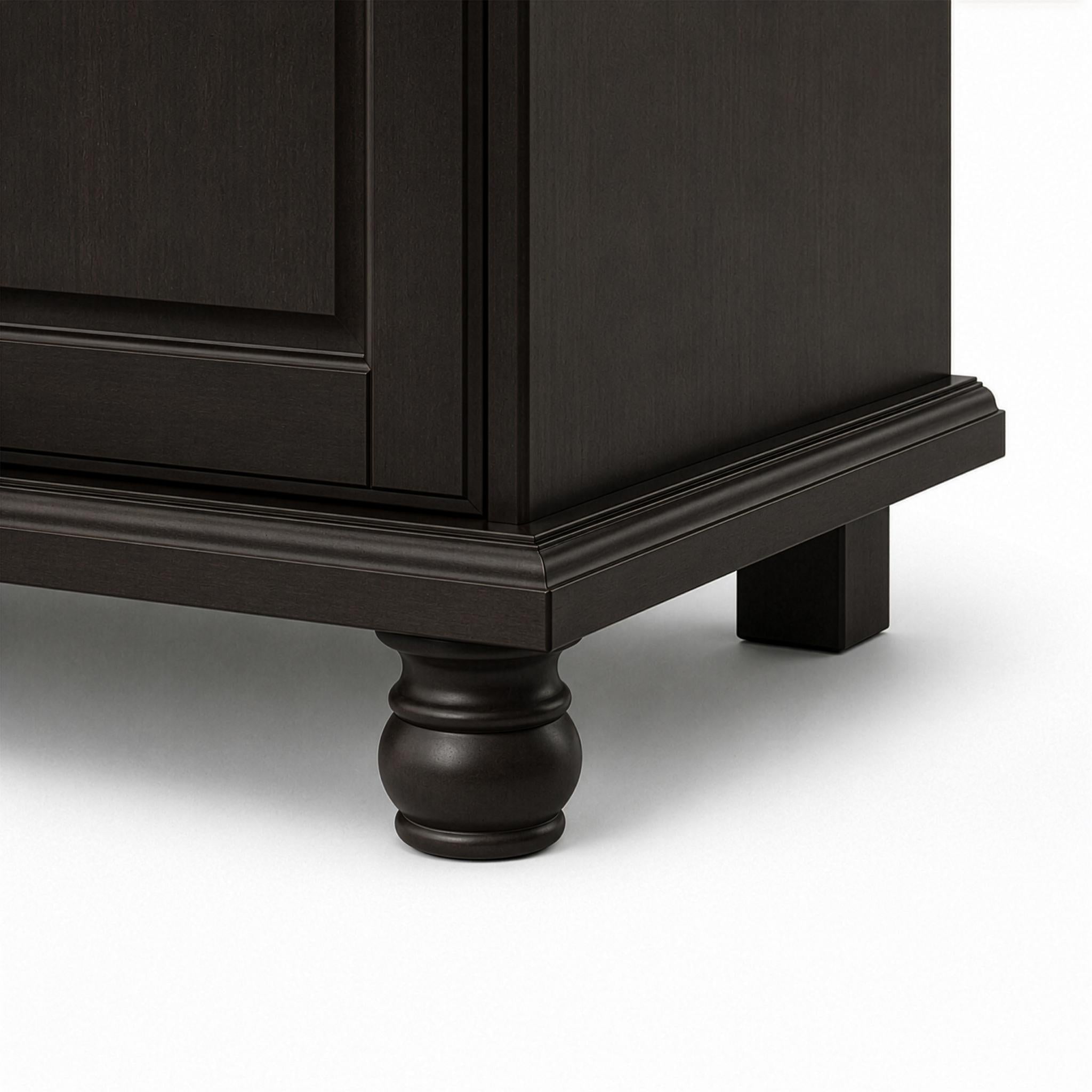 Espresso wood dresser corner with turned bun-foot and dark base trim