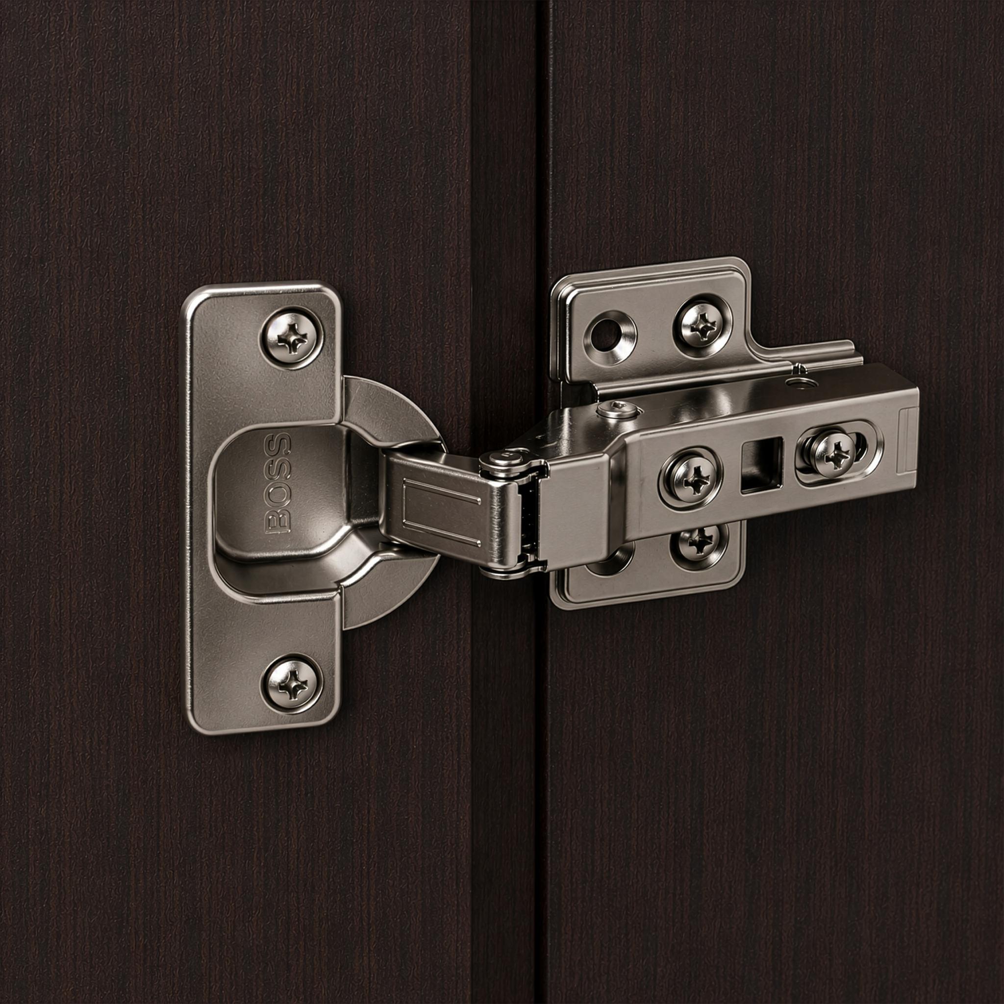 Dark brown solid wood dresser door with brushed metal hinges and latches