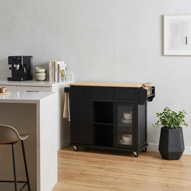 Black rolling kitchen cart with wood top, open center shelf, and side storage cabinets
