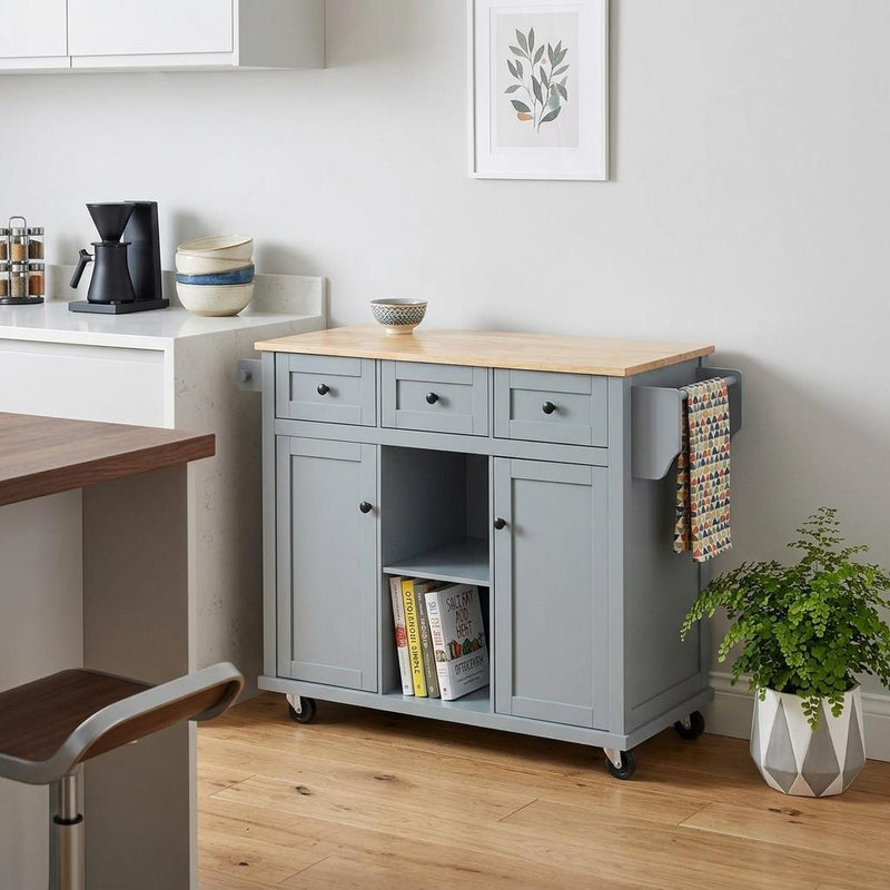 Rolling kitchen cart with light wood top, three drawers, double cabinet doors, open shelves