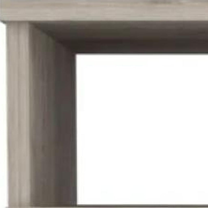 Light gray wood nightstand inner corner with open shelf