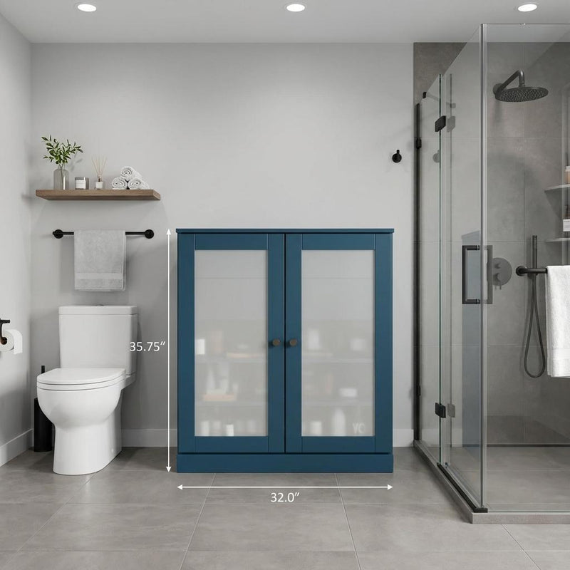 Teal blue linen cabinet featuring two glass doors with round knobs and wood frame