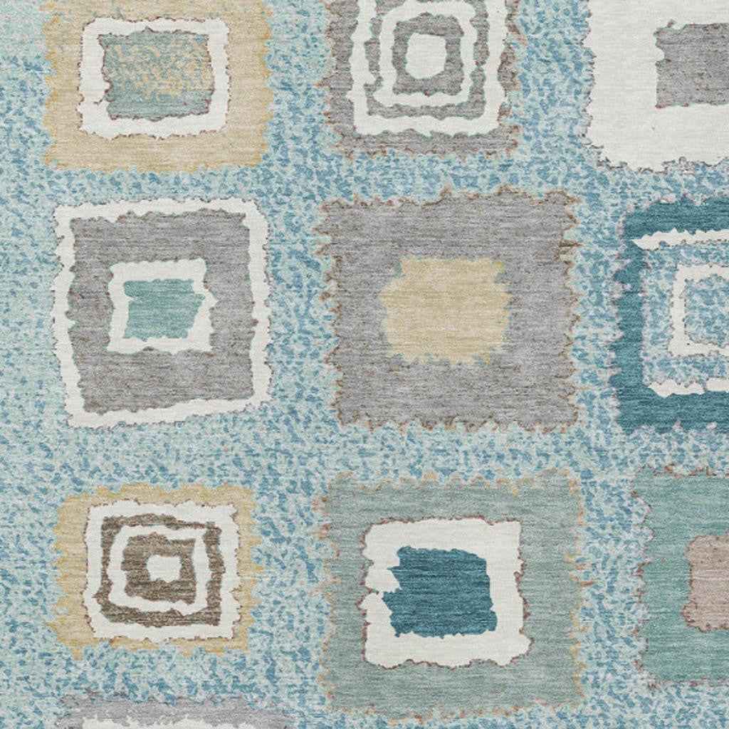 5' X 8' Teal Blue Beige And Ivory Geometric Washable Indoor Outdoor Area Rug