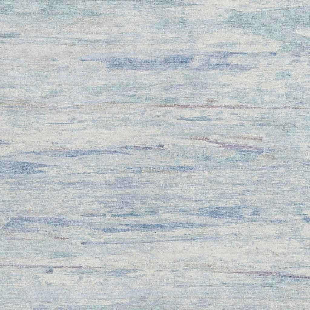 9' X 12' Sky Blue And Ivory Abstract Washable Indoor Outdoor Area Rug