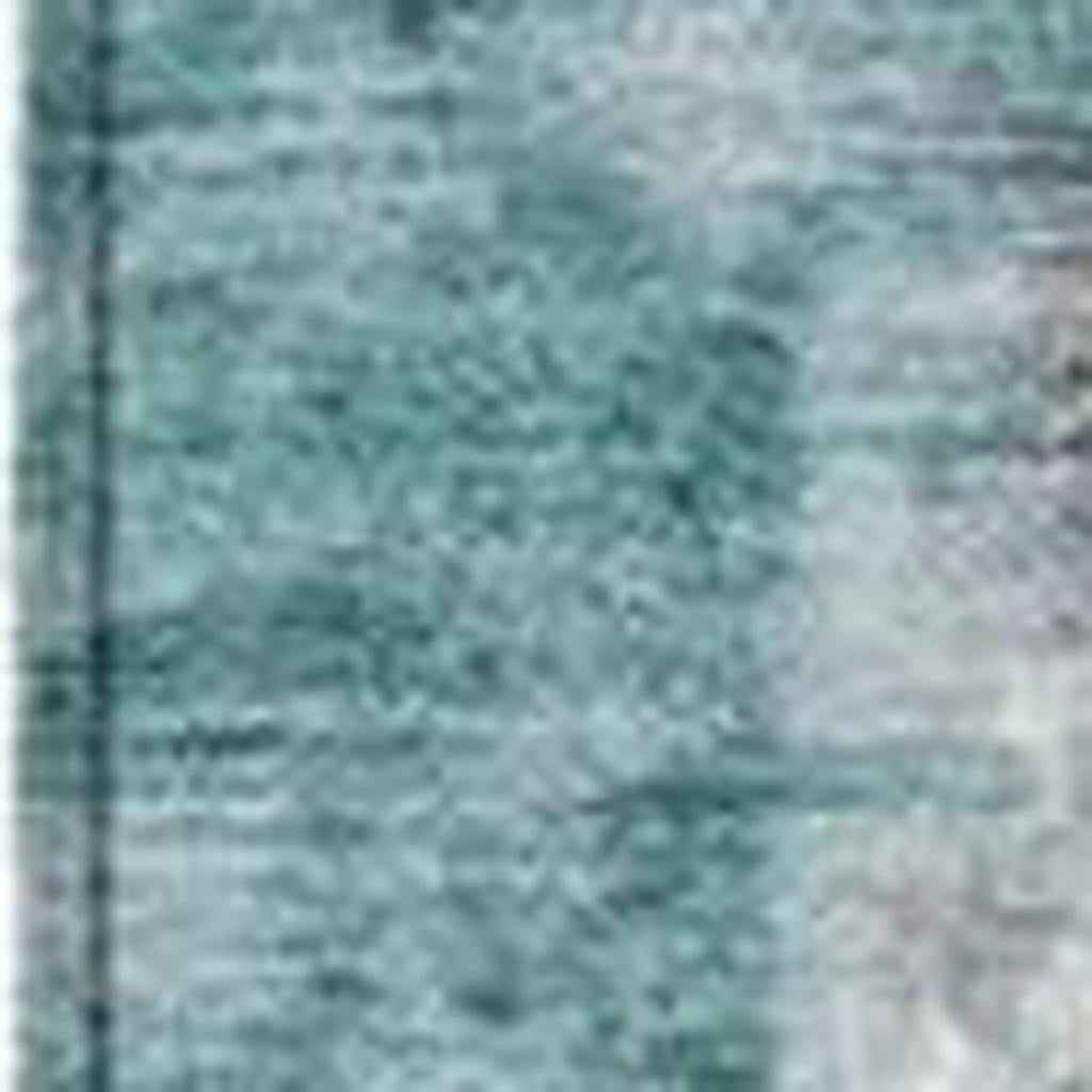 8' X 10' Teal Blue And Ivory Abstract Washable Indoor Outdoor Area Rug