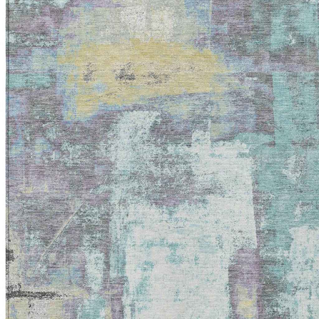 8' X 10' Teal Blue And Ivory Abstract Washable Indoor Outdoor Area Rug